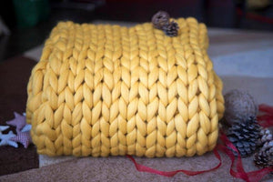 Yellow chunky knitted blanket